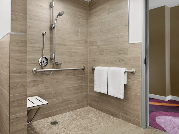 Accessible Classic One King Bed with Roll-In Shower at Pasadena Hotel & Pool
